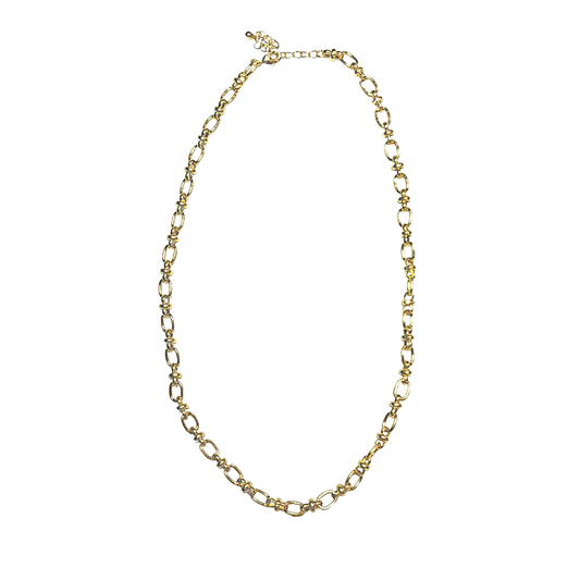 Gold chain necklace on a white background