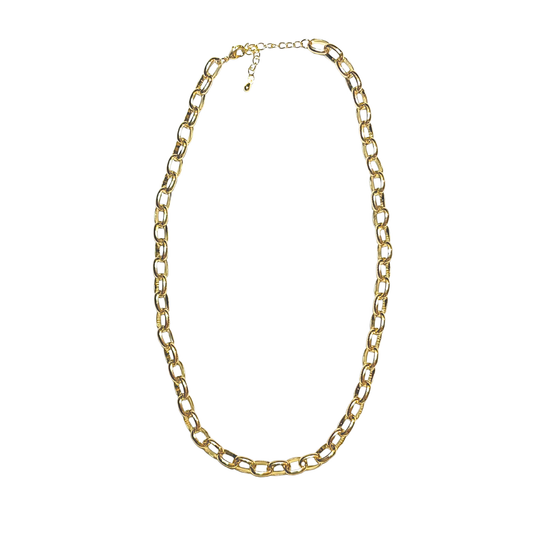 Gold chain necklace on a white background