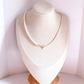 Two Sides To Every Story Necklace