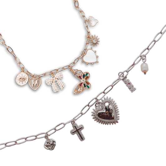 Two charm necklaces with various charms on a white background